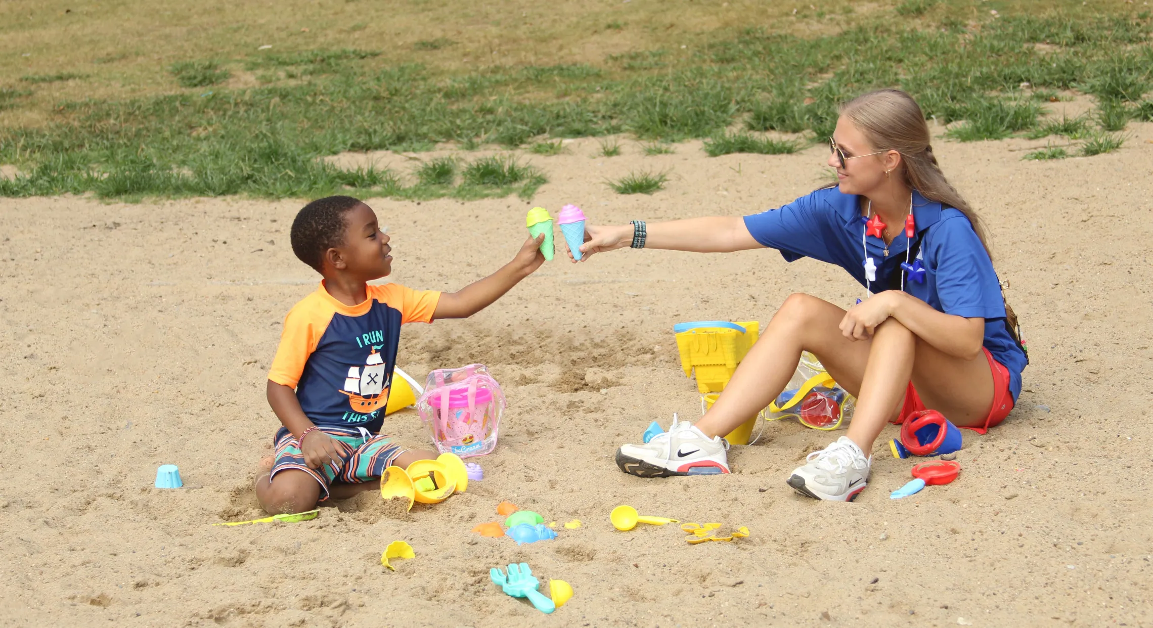 Staff member playing with child