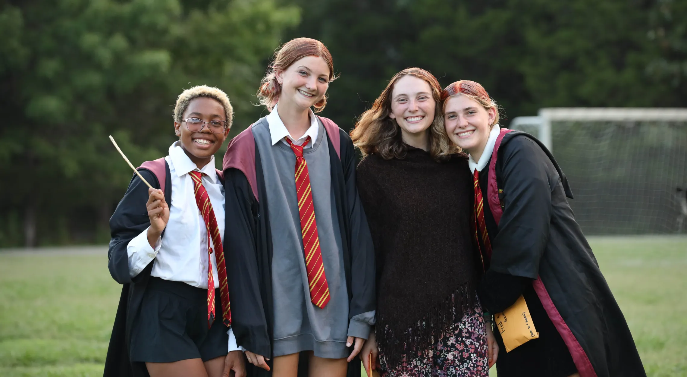 Kids dressed as Hogwarts students